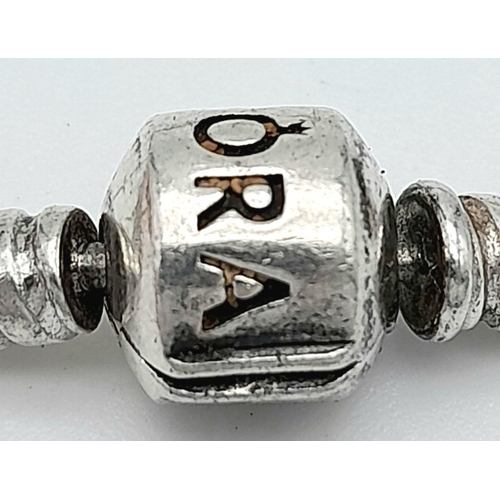 1402 - A PANDORA SILVER BRACELET .   14.5gms