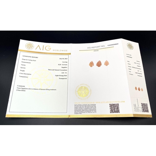 876 - Three 2.61ctw Light Orange Sapphires - Comes in a sealed container with an AIG certificate.