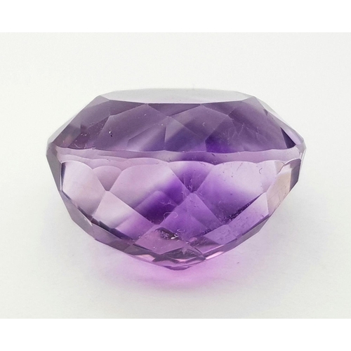 1451 - A 18.25ct Madagascar Natural Amethyst Gemstone, in the Oval Faceted Cut. Comes with the AIG Certific... 