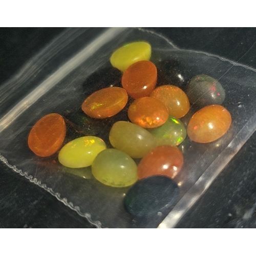 1528 - A lot of Natural Opal Gemstone. Yellow Blue and Prange Colour. 13.41ct in total.