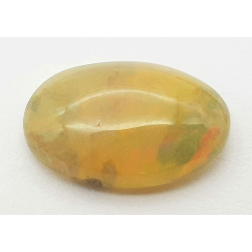 1353 - A 2.59ct Untreated Ethiopian Opal Gemstone - Oval Cabochon, Brown-Orange with Play of Colour. Comes ... 