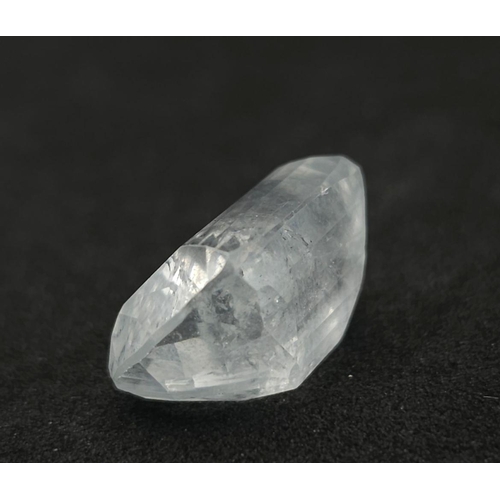 1311 - A 16.72ct Goshenite/Aquamarine Gemstone - Cushion Shape, Fancy cut. Comes with the GFCO Swiss Certif... 