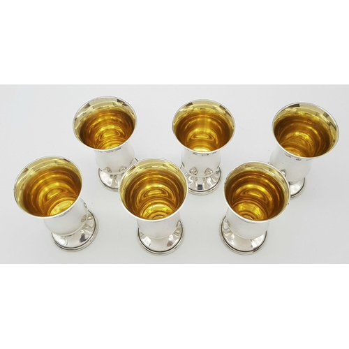 126 - An exceptional, British fully hallmarked, set of six sterling silver Kiddush cups in their original ... 