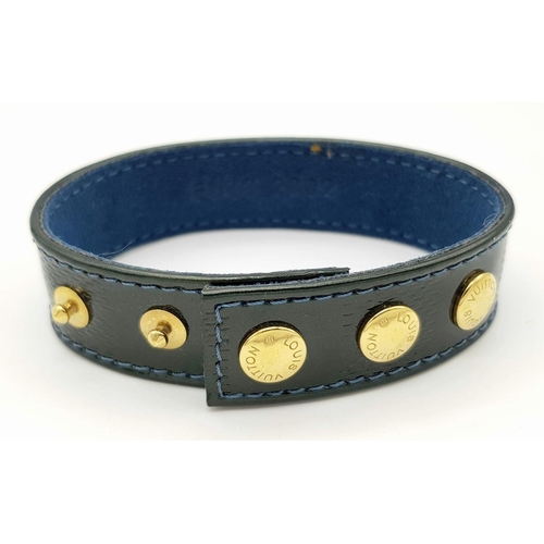 1275 - A Louis Vuitton Leather Bracelet with Gilded Studs.