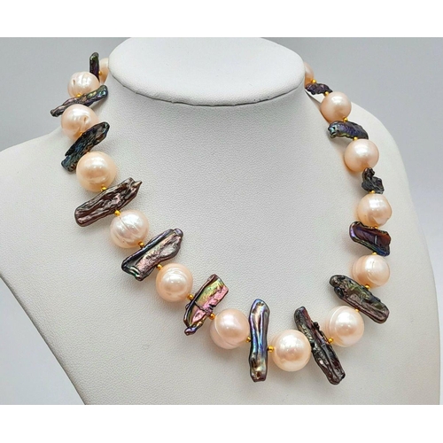 133 - A statement, pearl necklace with large (12-13 mm) cultured, mature, champagne pearls and unusual elo... 