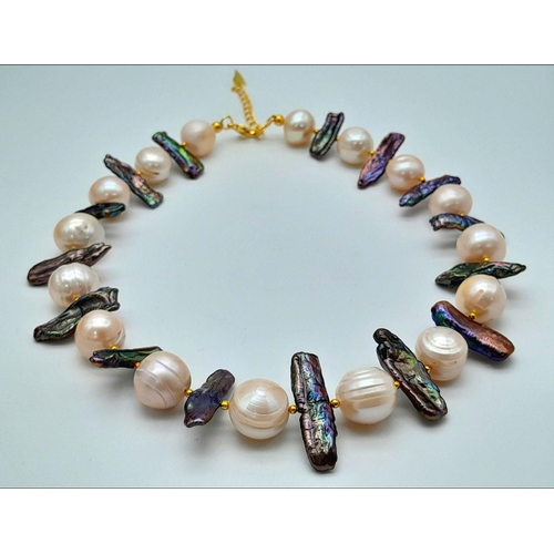 133 - A statement, pearl necklace with large (12-13 mm) cultured, mature, champagne pearls and unusual elo... 