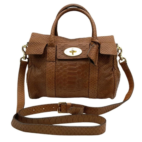 157 - A Mulberry Small Bayswater Satchel Bag. Textured exterior with gold tone furniture. Comes with a rem... 