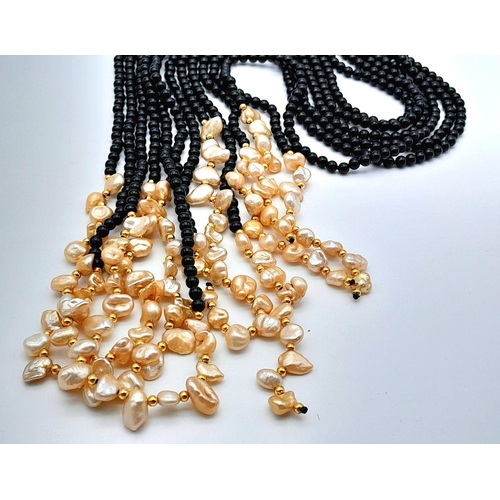 203 - A long, three strand, black onyx and cream coloured Keshi pearl necklace that can be worn in several... 