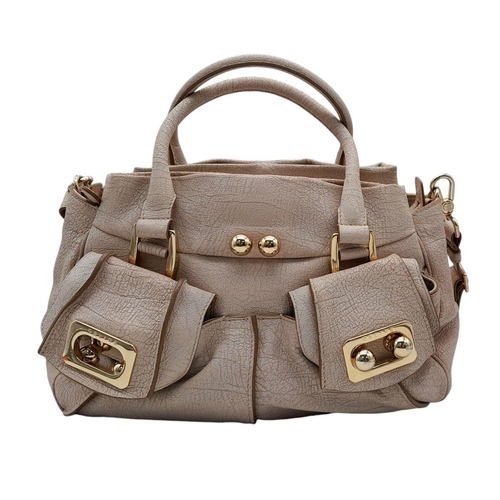 234 - A Celine Brown Leather Shoulder Bag. Gold tone hardware. Twin exterior pockets. Two large clip open ... 