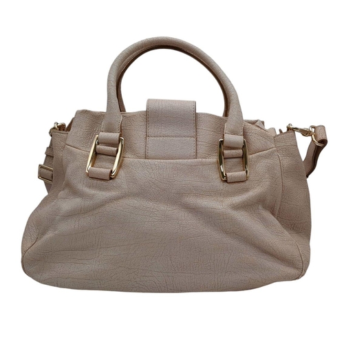 234 - A Celine Brown Leather Shoulder Bag. Gold tone hardware. Twin exterior pockets. Two large clip open ... 