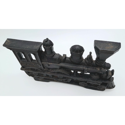 245 - An American, vintage, cast iron, door stopper in the shape of a steam locomotive. No broken parts. D... 