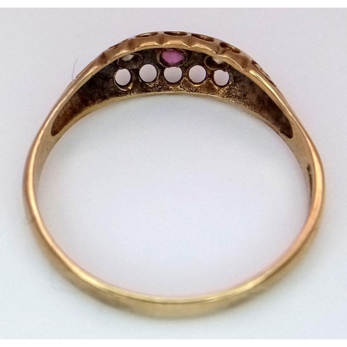 254 - An Antique 9K Gold Ruby and Diamond Ring. Size R. 1.8g total weight.