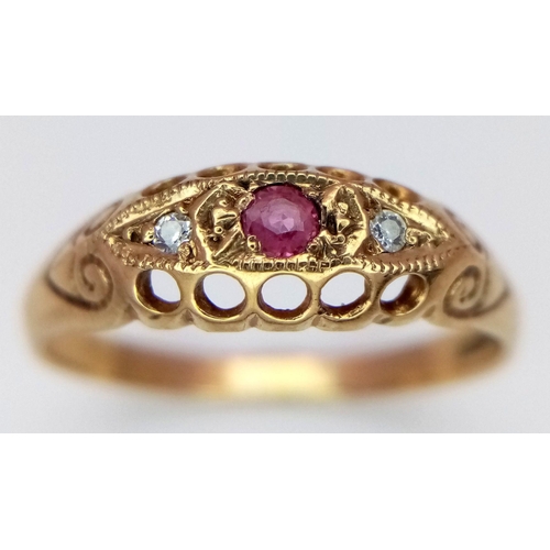 254 - An Antique 9K Gold Ruby and Diamond Ring. Size R. 1.8g total weight.