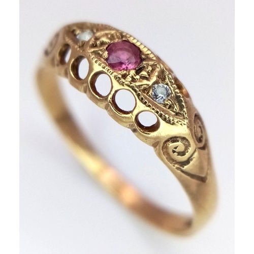 254 - An Antique 9K Gold Ruby and Diamond Ring. Size R. 1.8g total weight.