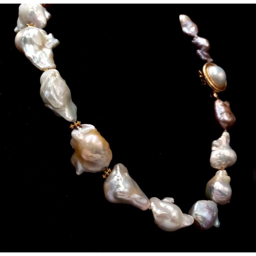 260 - A Mesmerising Vintage Baroque Pearl Necklace with a Stylish 14K Gold Clasp. Pastel shades of abstrac... 