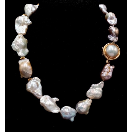 260 - A Mesmerising Vintage Baroque Pearl Necklace with a Stylish 14K Gold Clasp. Pastel shades of abstrac... 