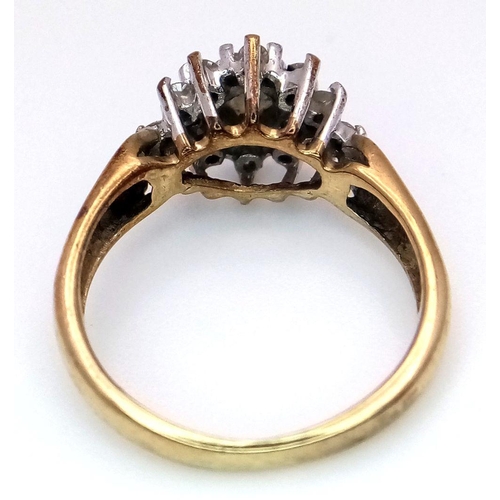 365 - A 9K Yellow Gold Diamond Cluster Ring. 0.50ctw of diamonds in floral form. Size L. 2.95g total weigh... 