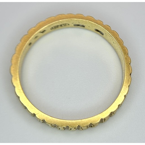 38 - An 18K Yellow Gold Ridged Band Ring. 4mm width. Size P 1/2. 4.3g weight.