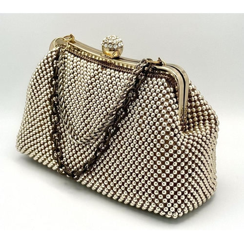 476 - A Vivienne Westwood Vintage Handbag. Geometric ball decoration with a stone set handle. 22cm x 13cm.... 