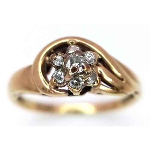 491 - A 9K Yellow Gold Diamond Crossover Ring. Size M. 2.05g total weight.