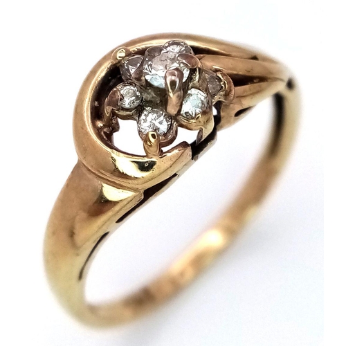 491 - A 9K Yellow Gold Diamond Crossover Ring. Size M. 2.05g total weight.