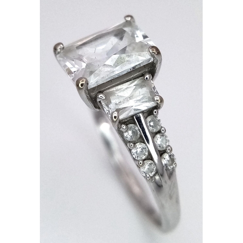 503 - A 9K White Gold Fancy White Zircon Ring. Size N. 2.45g total weight.