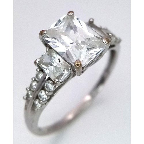 503 - A 9K White Gold Fancy White Zircon Ring. Size N. 2.45g total weight.