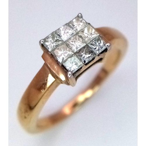 505 - A 9K Yellow Gold Diamond Ring. Nine Princess cut diamonds of 0.45ctw in a square formation. Size L 1... 