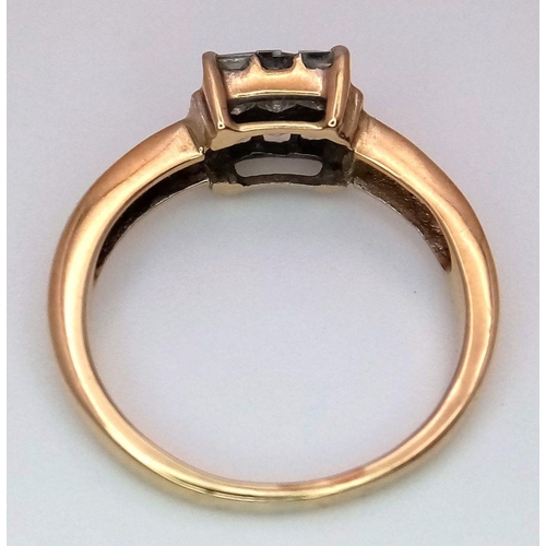 505 - A 9K Yellow Gold Diamond Ring. Nine Princess cut diamonds of 0.45ctw in a square formation. Size L 1... 