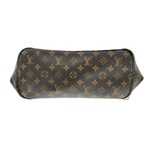 81 - A Louis Vuitton Monogram Canvas Neverfull MM Tote Bag. Monogram canvas exterior with natural cowhide... 