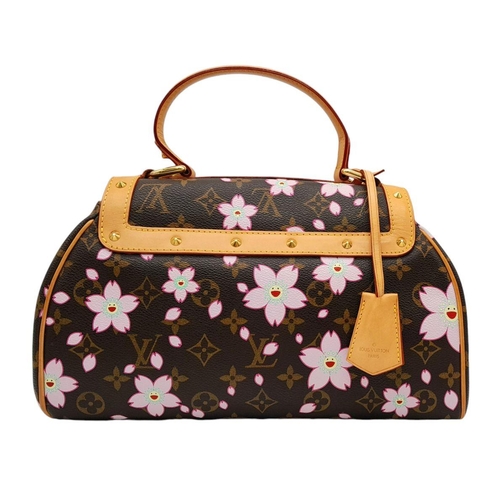 834 - A Louis Vuitton Blossom Butterfly Bag. Monogram canvas exterior with pink blossom decoration. Leathe... 