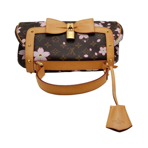 834 - A Louis Vuitton Blossom Butterfly Bag. Monogram canvas exterior with pink blossom decoration. Leathe... 