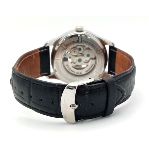 939 - A Sturhling Automatic Skeleton Gents Watch. Black leather strap. Stainless steel case - 42mm. Black ... 