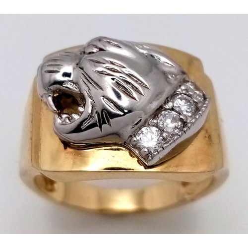 1334 - A Men’s Two Tone, Yellow Gold Gilt Sterling Silver Puma Head Ring Size T. The Ring Measures 1.7cm Wi... 