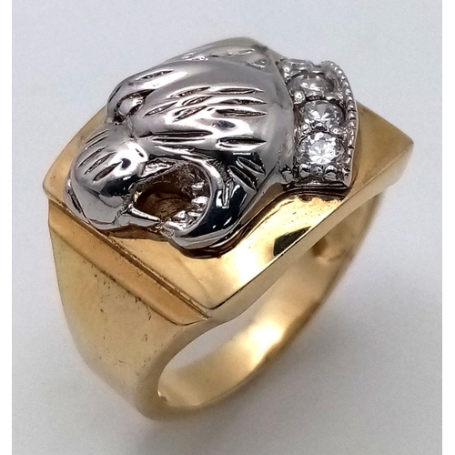 1334 - A Men’s Two Tone, Yellow Gold Gilt Sterling Silver Puma Head Ring Size T. The Ring Measures 1.7cm Wi... 