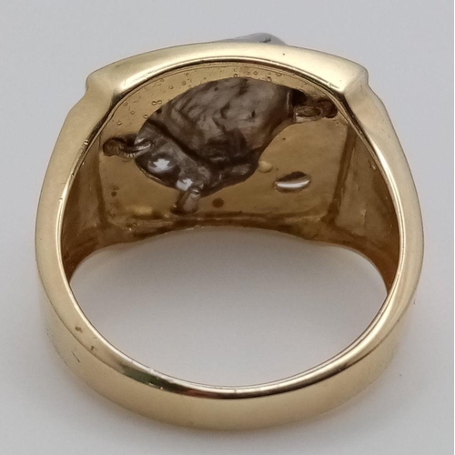 1334 - A Men’s Two Tone, Yellow Gold Gilt Sterling Silver Puma Head Ring Size T. The Ring Measures 1.7cm Wi... 