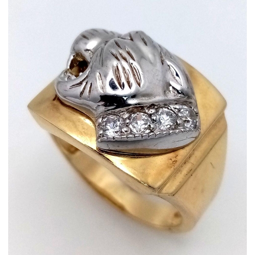 1334 - A Men’s Two Tone, Yellow Gold Gilt Sterling Silver Puma Head Ring Size T. The Ring Measures 1.7cm Wi... 