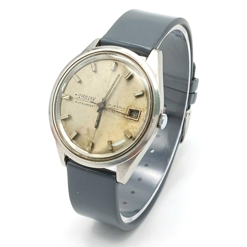 1342 - A Vintage Orient 21 Jewels Autodater Gents Watch. Grey rubber strap. Stainless steel case - 37mm. Si... 