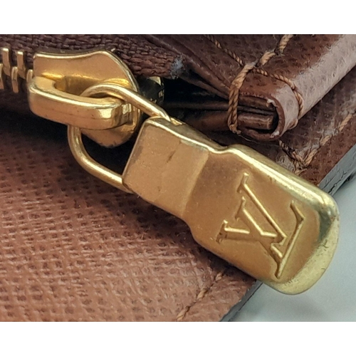 877 - Louis Vuitton Sarah Wallet Monogram Canvas. Monogram coated canvas exterior with gold-tone hardware ... 