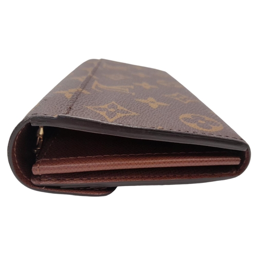 877 - Louis Vuitton Sarah Wallet Monogram Canvas. Monogram coated canvas exterior with gold-tone hardware ... 