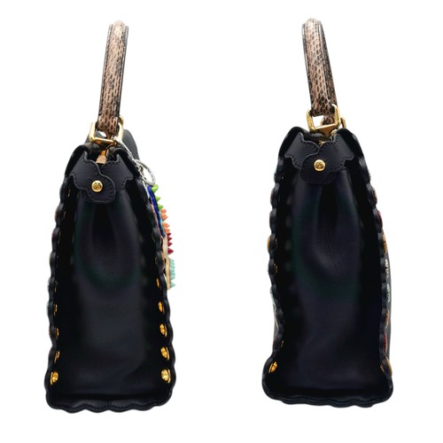 4 - A Fendi Peekaboo Bag. Black leather exterior with multi-colour eyelets and 'Love' fob. Gold tone har... 