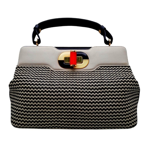 850 - A Bvlgari Black and Cream Isabella Rossellini Handbag. Woven leather exterior with gold-toned hardwa... 