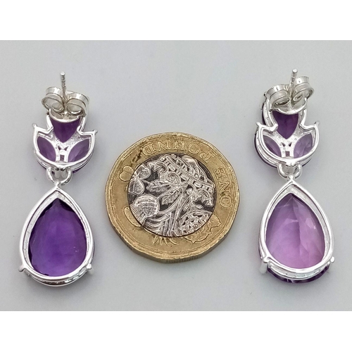 927 - A Pair of Amethyst Drop Earrings set in 925 Silver. 3.5cm drop. CD-1510