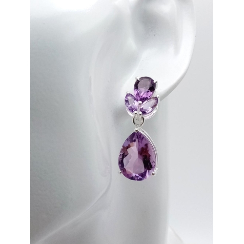 927 - A Pair of Amethyst Drop Earrings set in 925 Silver. 3.5cm drop. CD-1510