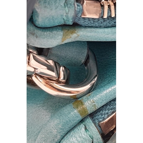 730 - A Miu Miu Turquoise Crystal Bag. Matelasse leather exterior with silver-toned hardware, detachable a... 