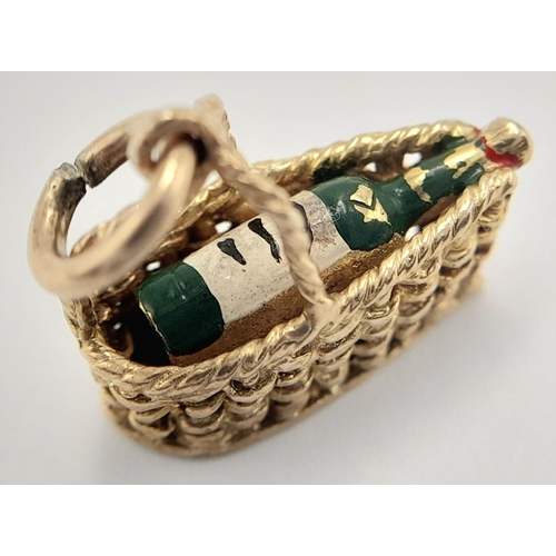 1484 - A 9K YELLOW GOLD WINE BASKET CHARM WITH BOTTLE OF WINE INSIDE 3.2G , APPROX 20MM X 18MM. Ref: SC 404... 