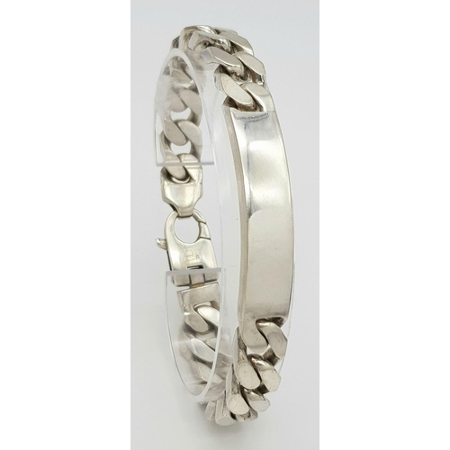 1218 - A STERLING SILVER HEAVY ID BRACELET. 65.3G. SC3096.