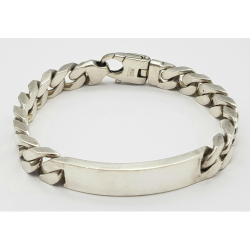 1218 - A STERLING SILVER HEAVY ID BRACELET. 65.3G. SC3096.