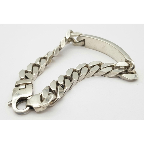 1218 - A STERLING SILVER HEAVY ID BRACELET. 65.3G. SC3096.