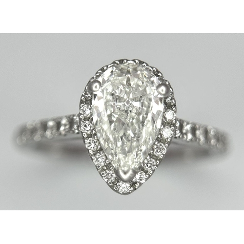 1155 - A PLATINUM 950 ( TESTED ) PEAR SHAPE DIAMOND HALO RING MAIN PEAR SHAPE DIAMOND APPROX 0.65CT 3.91G S... 